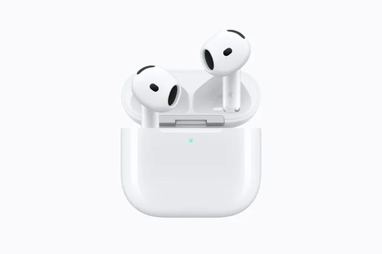 White AirPods 5 earbuds in their open charging case