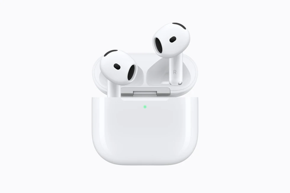 White AirPods 5 earbuds in their open charging case