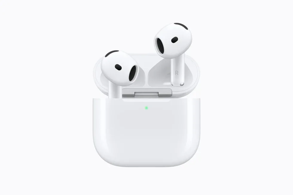 Apple AirPods 5 without silicone tips in their open white charging case