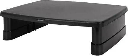 Amazon Basics adjustable monitor riser with open storage underneath