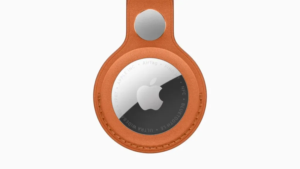 Apple AirTag second generation in an orange FineWoven Key Ring