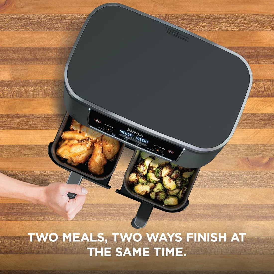 Ninja DZ201 two baskets open with chicken and vegetables cooking for Smart Finish