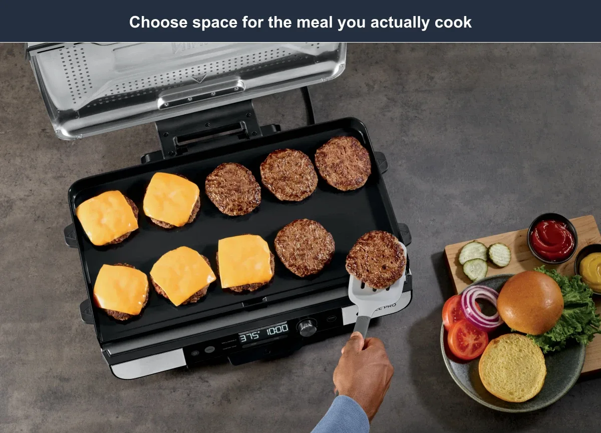 Manufacturer photograph showing burgers spread across the Sizzle Pro XL GX101 flat cooking plate
