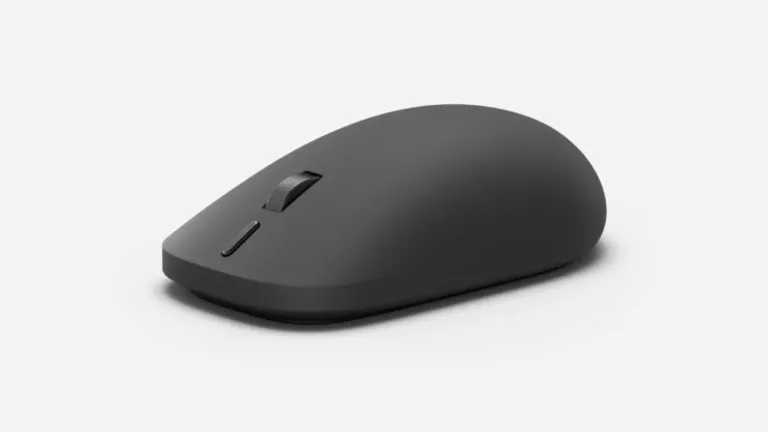 Black Microsoft Surface Mouse (2nd Edition), with scroll wheel and action button, shown at an angle.