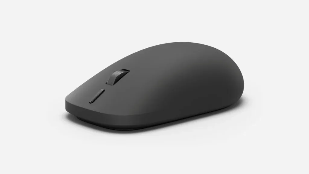 Black Microsoft Surface Mouse (2nd Edition), with scroll wheel and action button, shown at an angle.